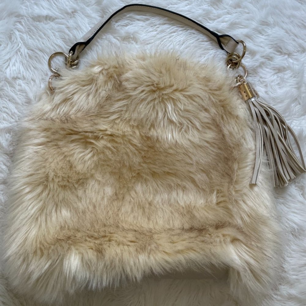 River Island Faux fur/ faux Leather Slouchy handbag with tassels Cream